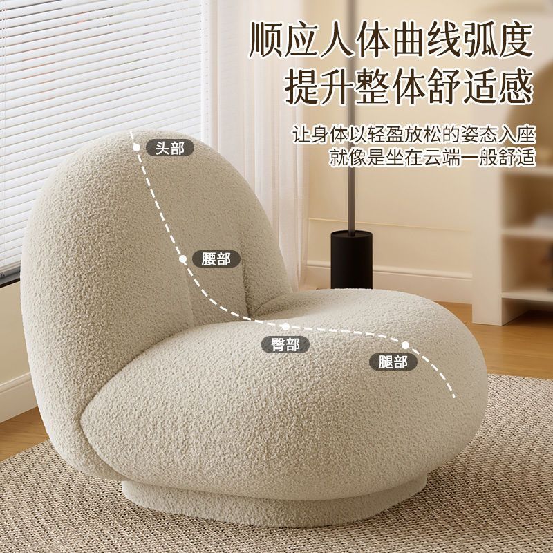 Single seater swivel sofa with lambswool upholstery and 360-degree swivel base