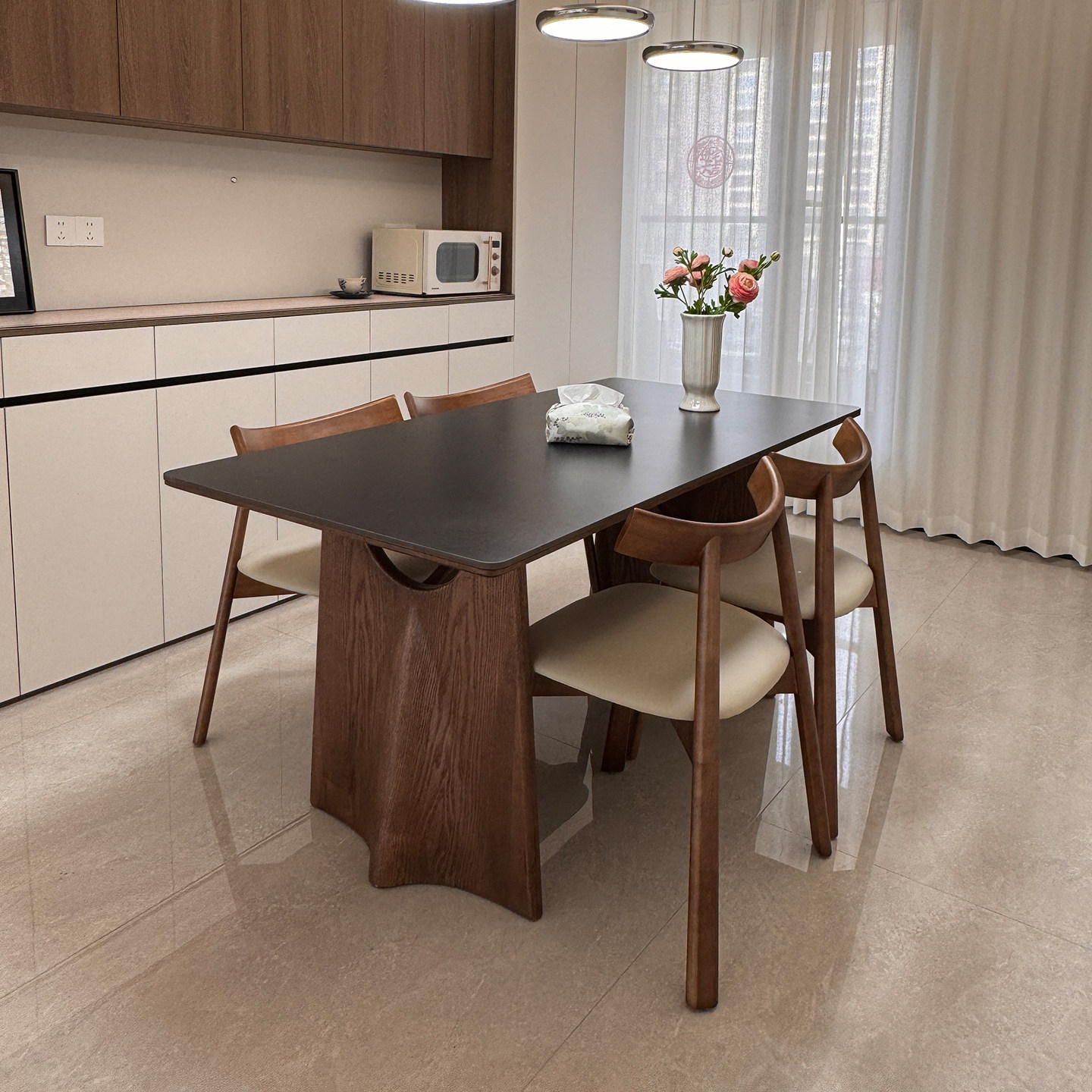 Rock slab dining table in modern dining room Fuzhou Qiankun Manufacturing Co., Ltd. sintered stone table wholesale
