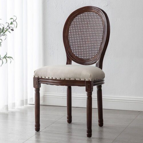 Classic wooden chair with woven backrest and cushioned seat.