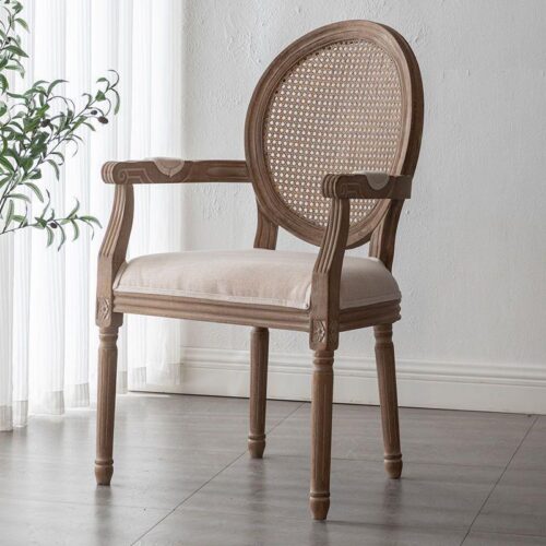 Wooden armchair with cane backrest and cushioned seat.