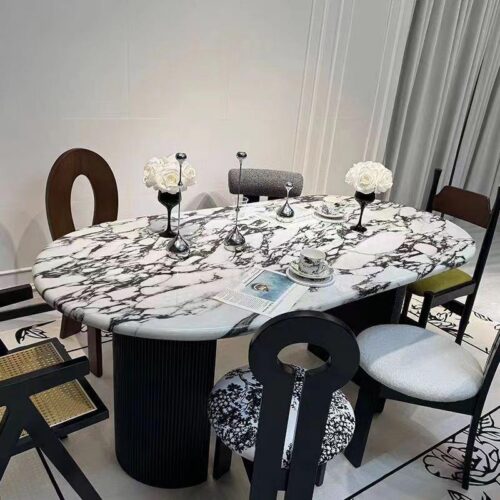 Oval Artificial Marble Dining Table Fluted Carbon Steel Leg Modern Luxury Dinner Table - Dining table - QONKA HOME