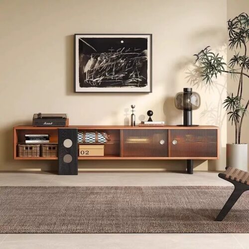 Modern wooden media console with glass doors and storage baskets.