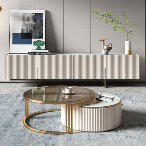 Modern round glass-top coffee table with gold frame.