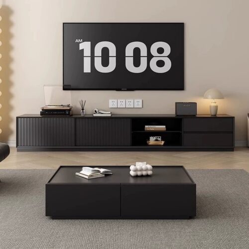 Modern black TV console with matching coffee table.