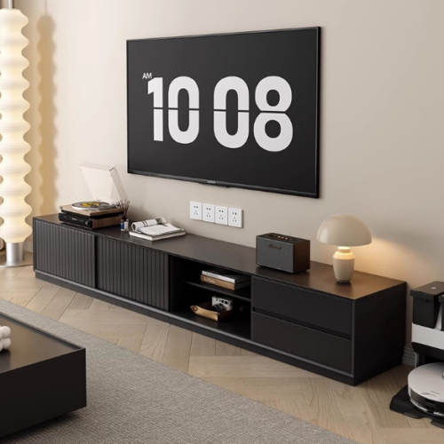 Modern black TV console with open shelves and drawers.