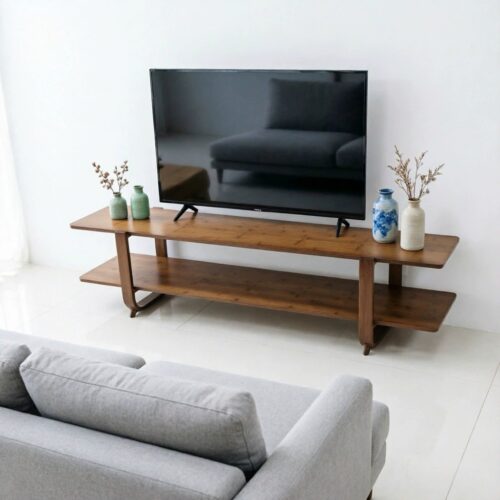 Modern wooden TV stand with lower shelf and decorative vases.