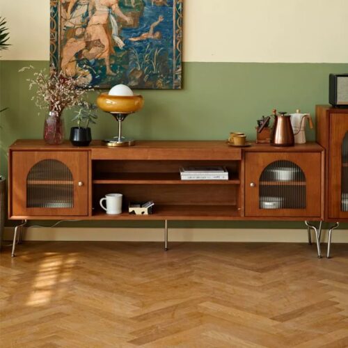 Mid-century modern wooden cabinet with arched glass doors.