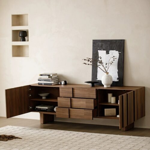 Modern wooden sideboard with open doors and decorative items.