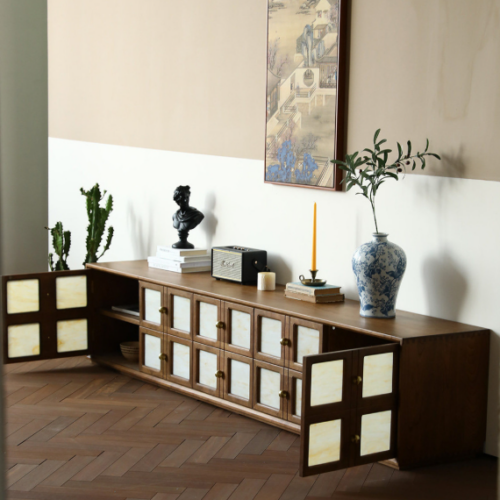 Wooden cabinet with glass panels and decorative items