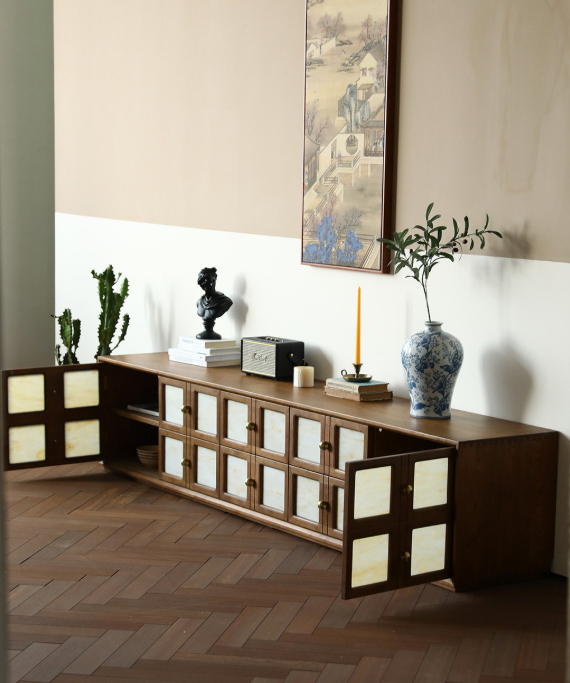 Wooden cabinet with glass panels and decorative items