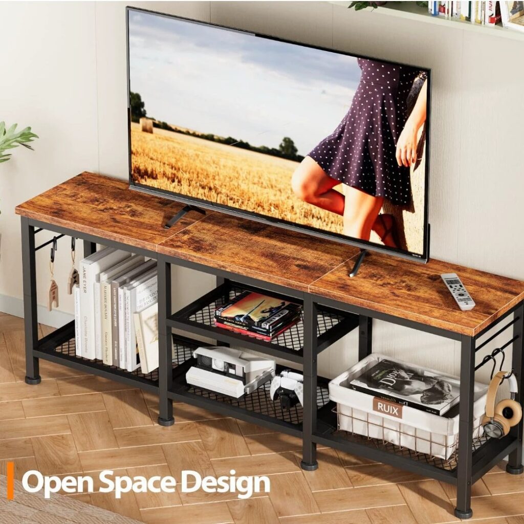Industrial style TV stand with open shelves and wooden top.