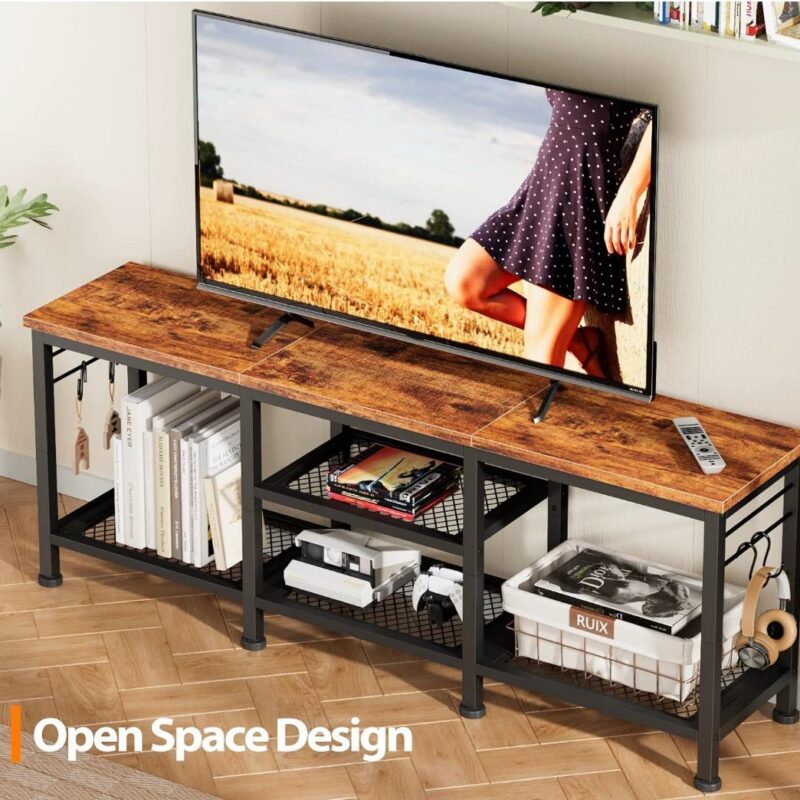 Industrial style TV stand with open shelves and wooden top.