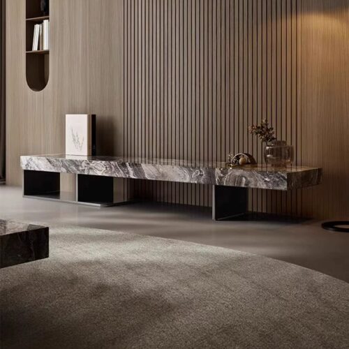 Modern marble-top media console with sleek black legs.