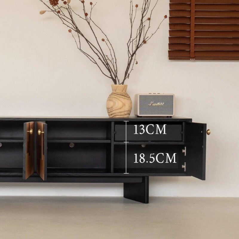 Black modern media console with open doors and internal storage shelves.