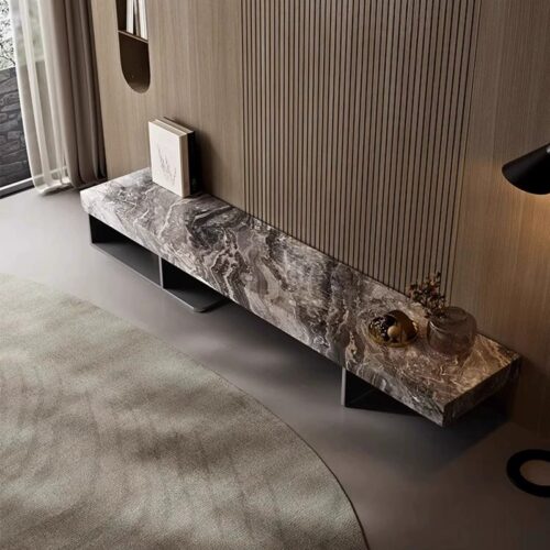 Modern marble TV console with sleek metal legs and decorative accents.
