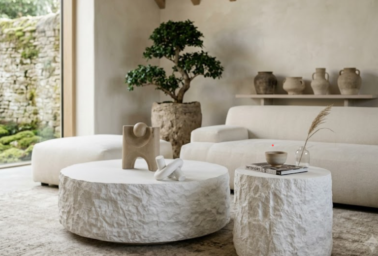 Sculptural stone-look coffee table set in off-white resin fiberglass from QONKA HOME