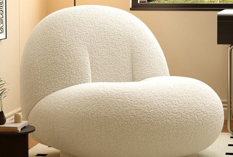 Lambswool single-seater swivel sofa in soft cream fabric from QONKA HOME